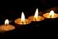 burning-candles-in-the-dark-small